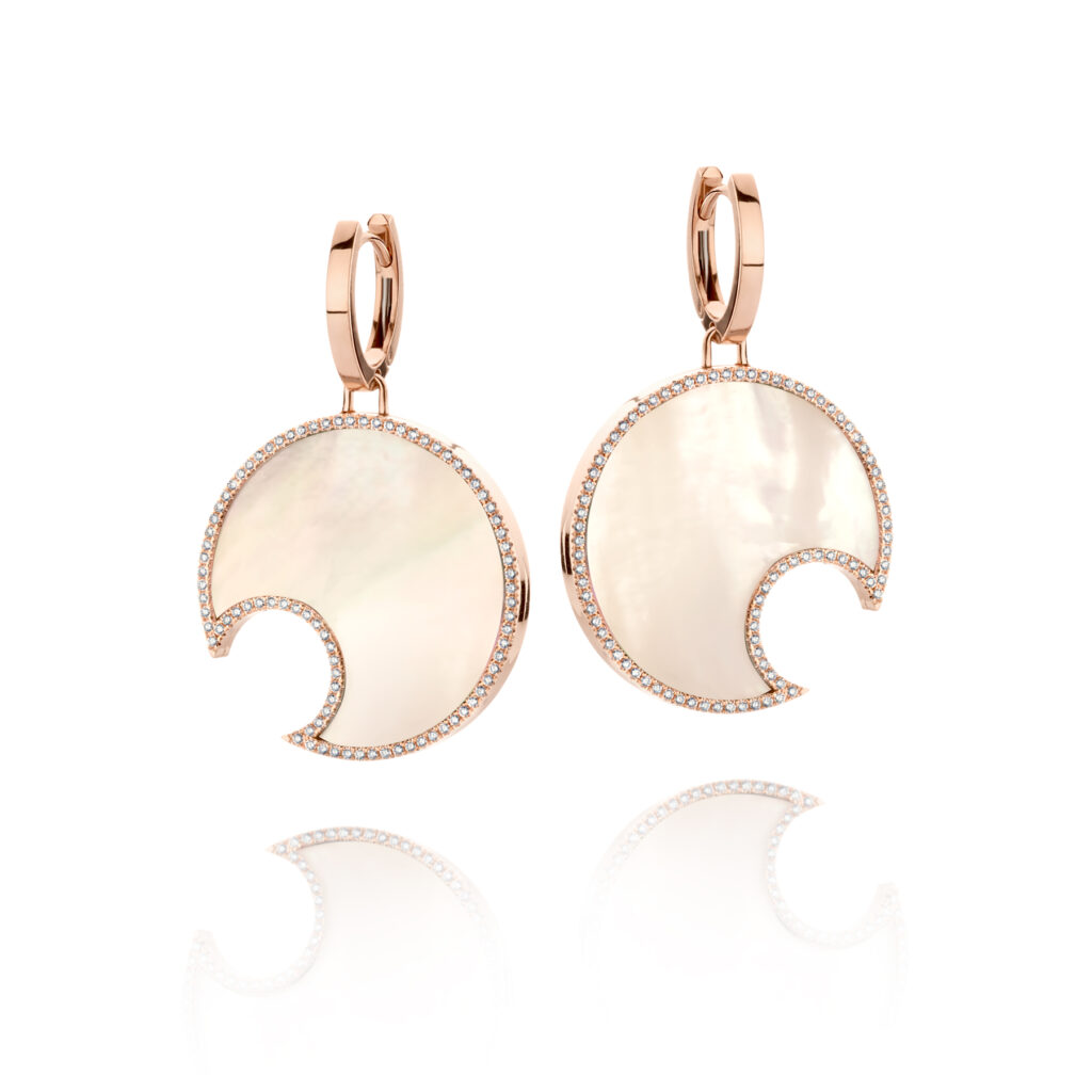 18K Gold and white Mother of pearl earrings
Carat: 0,85 ct natural diamonds

The Cleo collection is an invitation into the seductive atmosphere of a remote private island. It's a collection for when everything feels possible.

Model: 5925WMOP

White mother of pearl
Personalize your creation
Enjoy our complimentary engraving service.